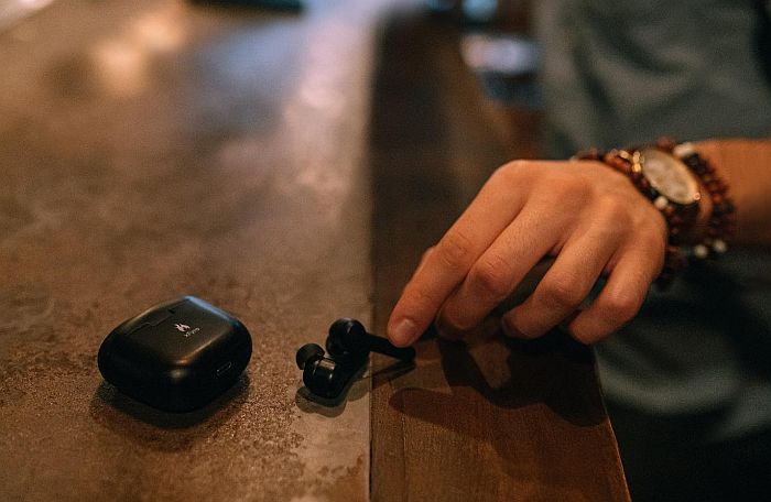 xfyro headphones with case on a counter top