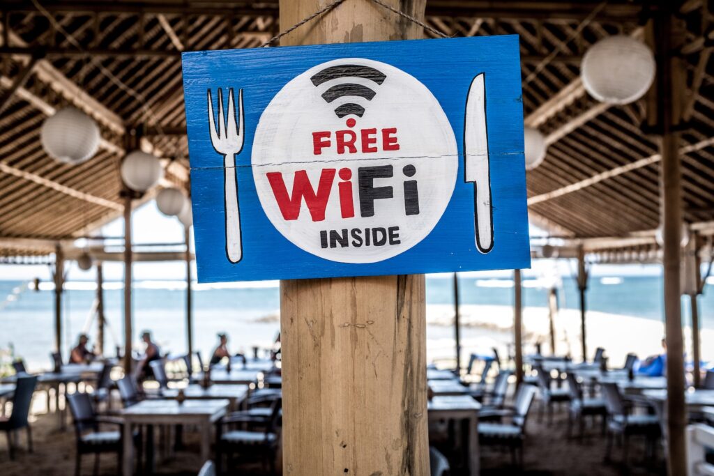 A restaurant with a signboard saying Free Wifi Inside